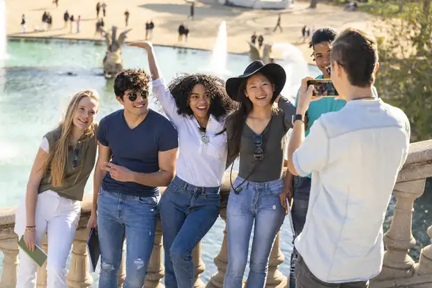 A group of visitors taking a photograph together