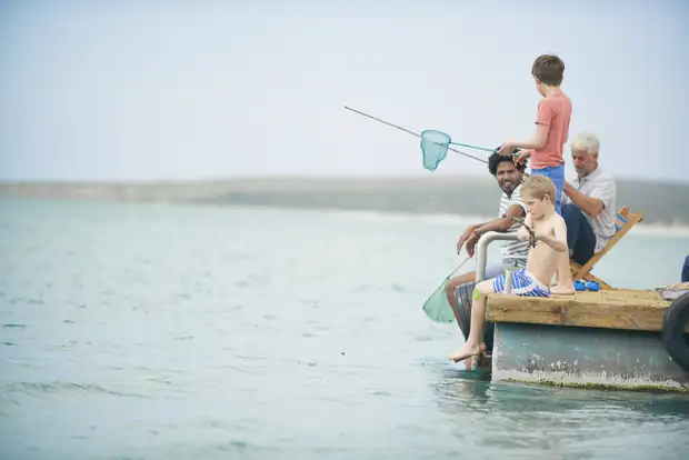A family on a boat deck