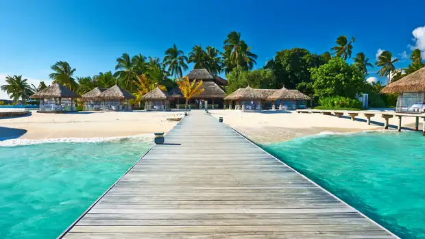 A jetty reaching out over calm water